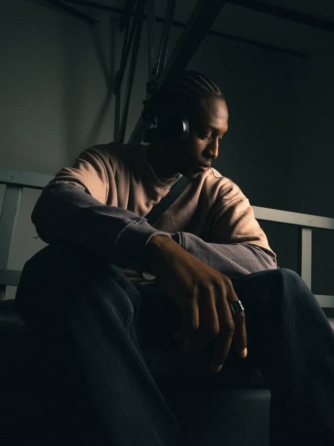 Seated portrait in low light